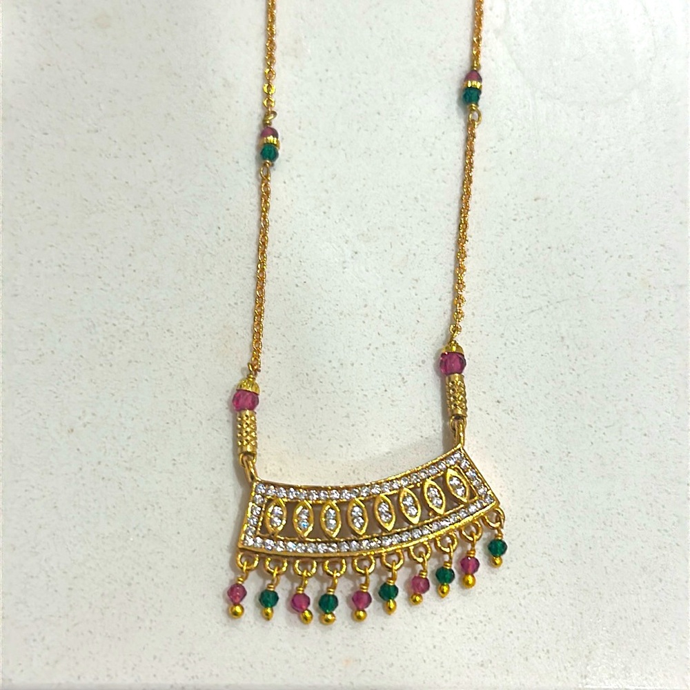 Elegant Gold Necklace with Pink and Green Accents